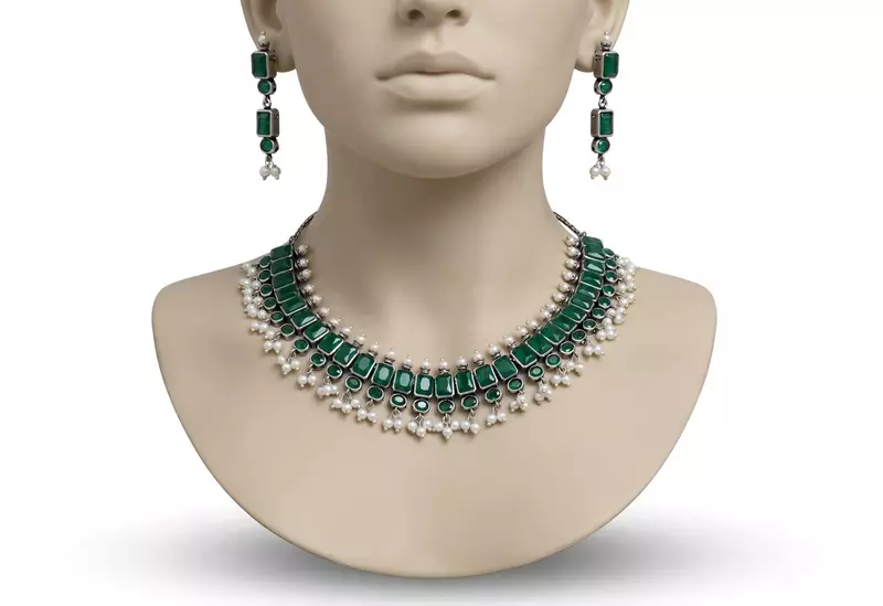 Green stone studded oxidised choker necklace with matching green drop earrings